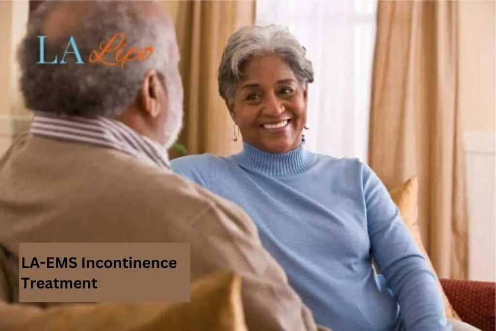 Couple sat smiling at each other - LA-EMS treatment St Helens