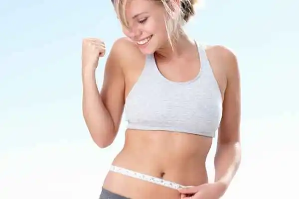 woman happy after fat reduction treatment St Helens